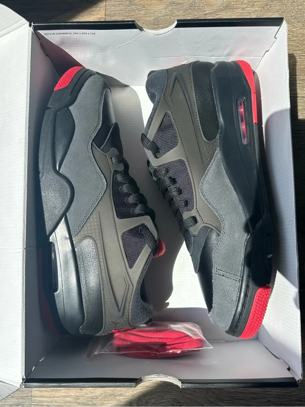 Air Jordan 4 RM “Bred”